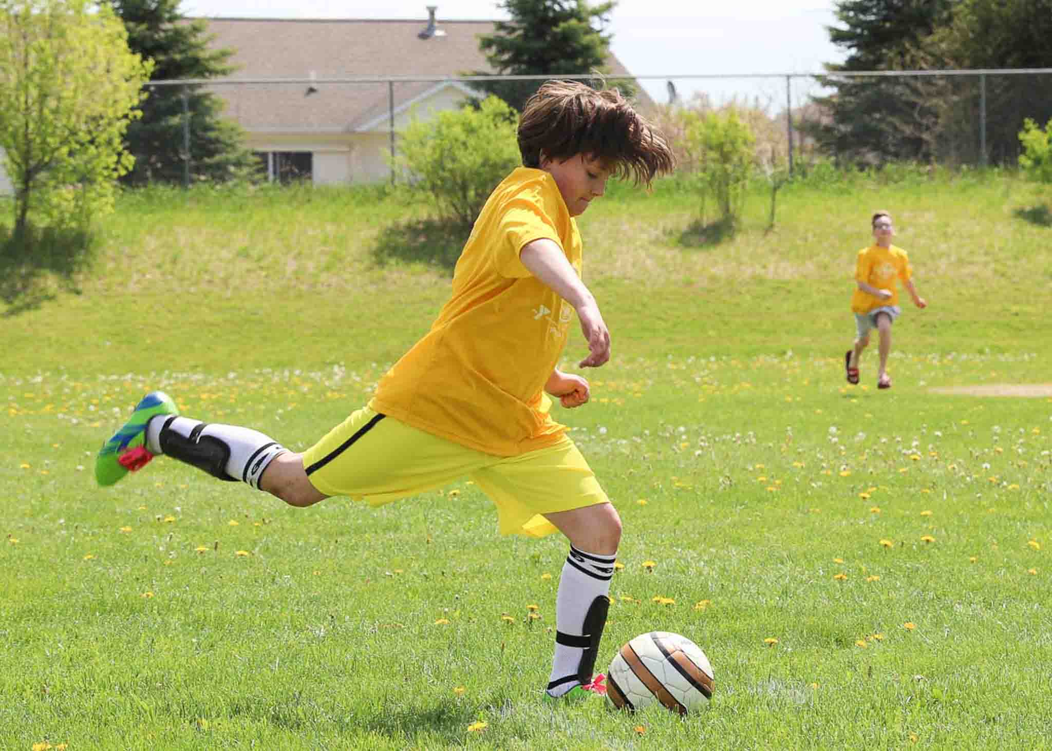 Daughter playing soccer