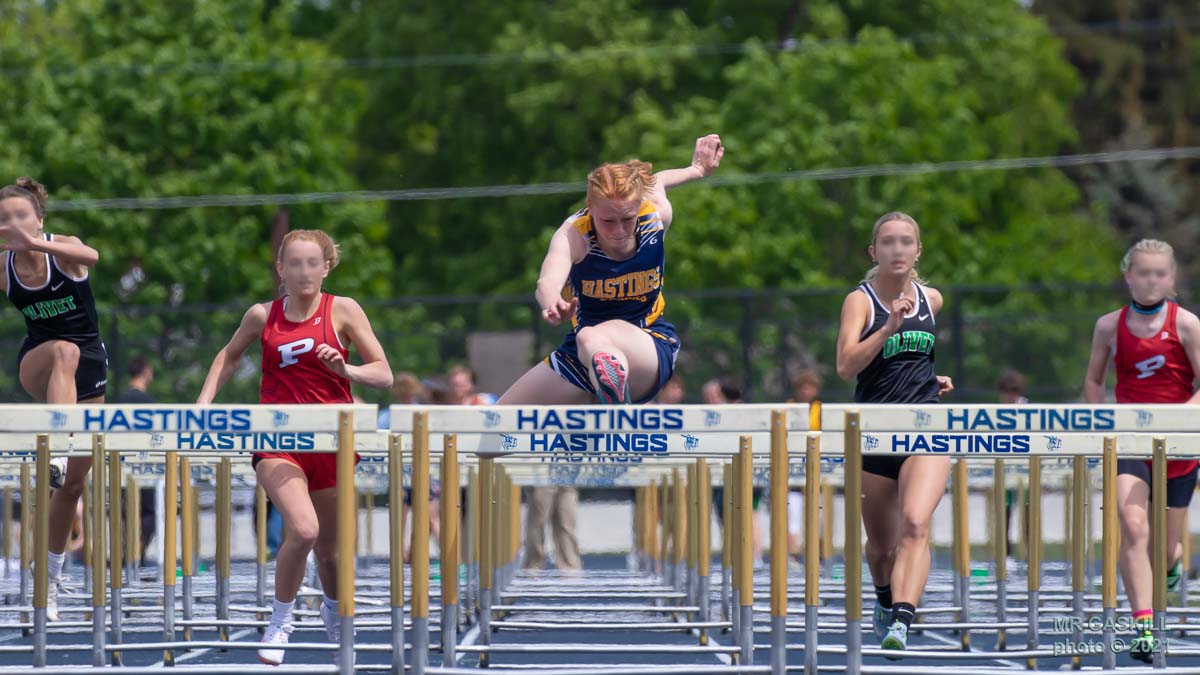 Girl running during track